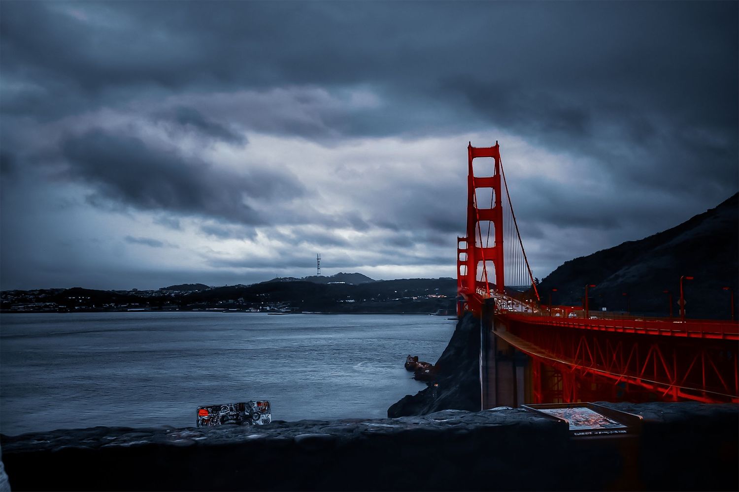 The iconic Golden Gate Bridge under stormy skies in San Francisco.