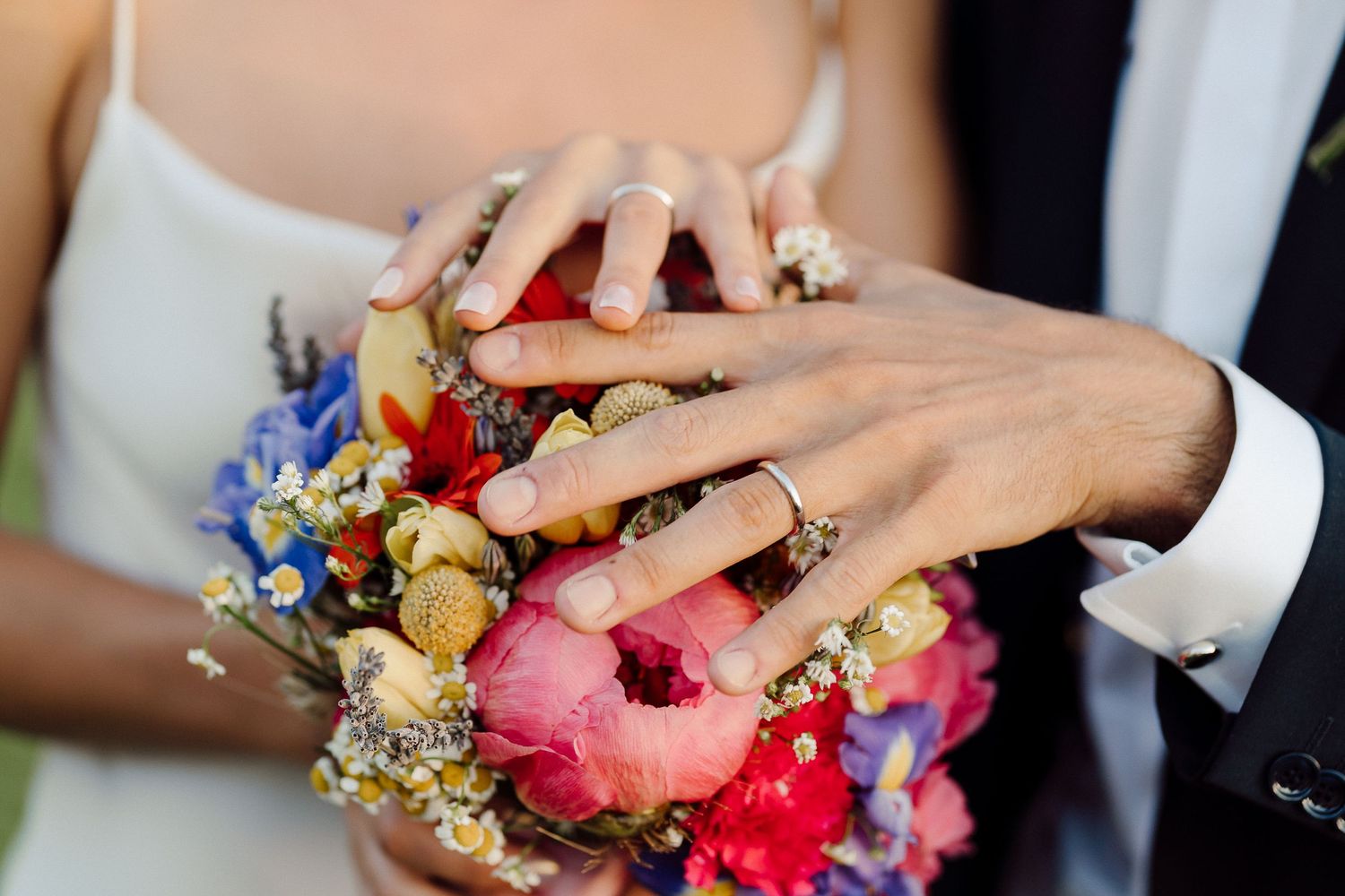 Artistic detail of wedding bands captured with cinematic lighting — a timeless symbol of love and commitment.