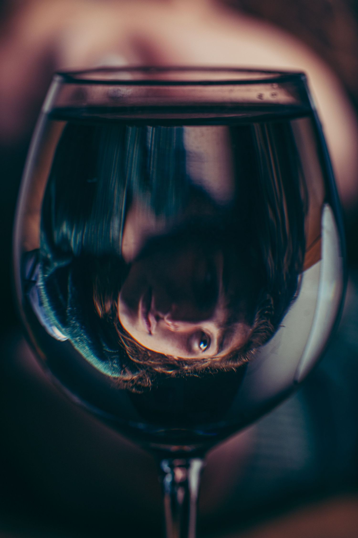 Creative wine glass photography series with reflections and distortions.