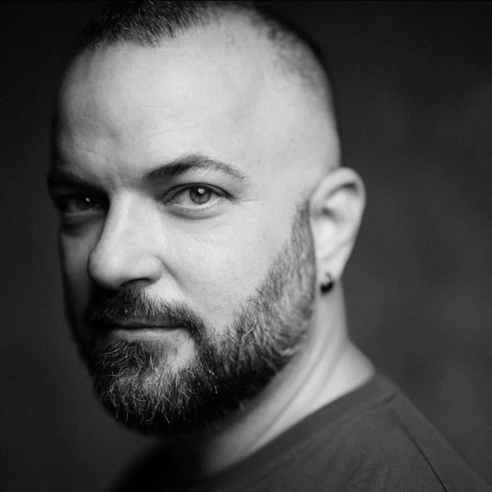 Black and white portrait series emphasizing eyes and facial features in dramatic lighting.