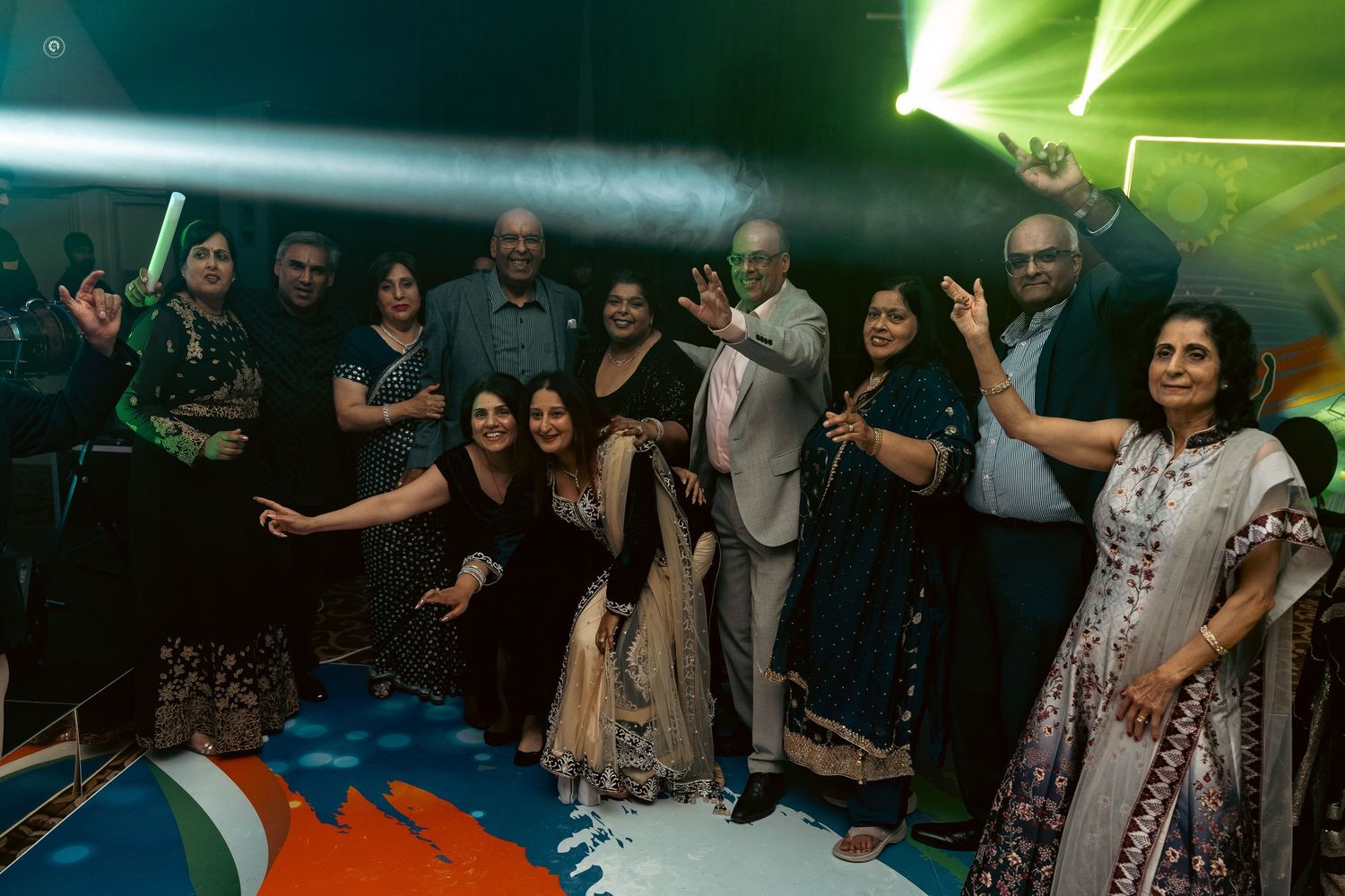 People dancing and celebrating together at what appears to be a lively party or social gathering.