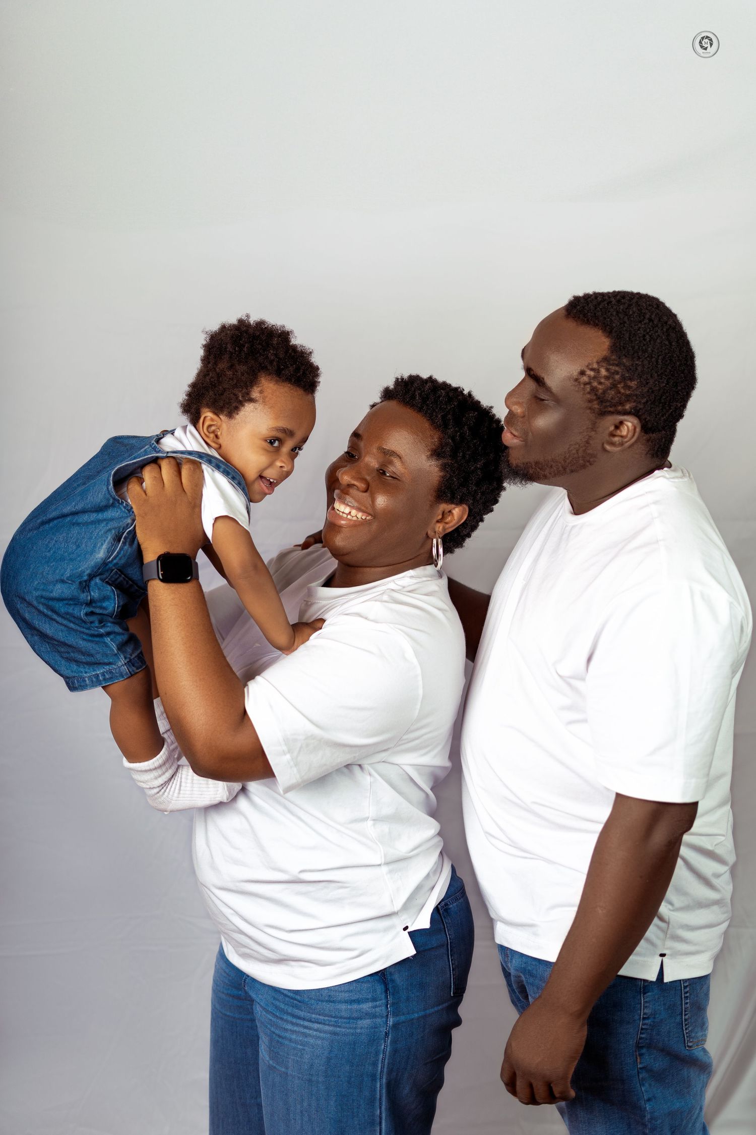 A sequence of four photos showing joyful family interaction between parent and child against a light background.