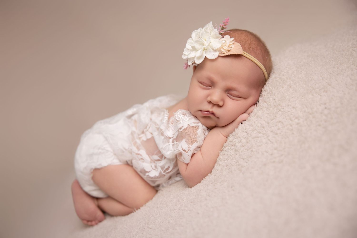 Peaceful newborn portrait with natural light in Layton photography studio