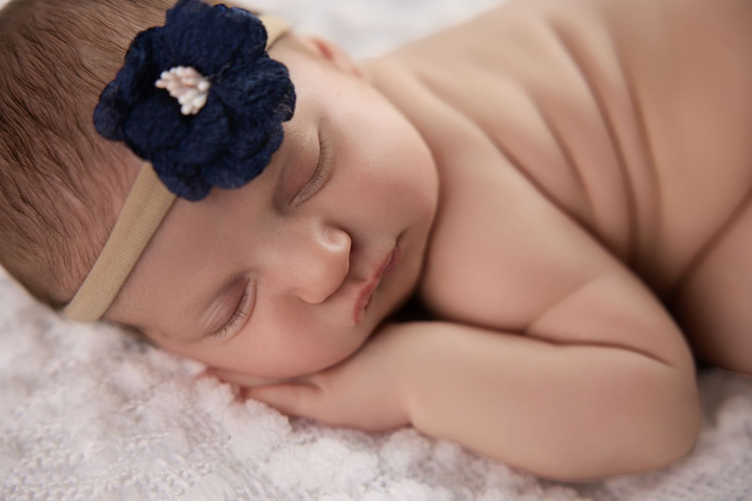 Utah County newborn photographer studio session — simple, classic, true-to-color portrait of sleeping baby