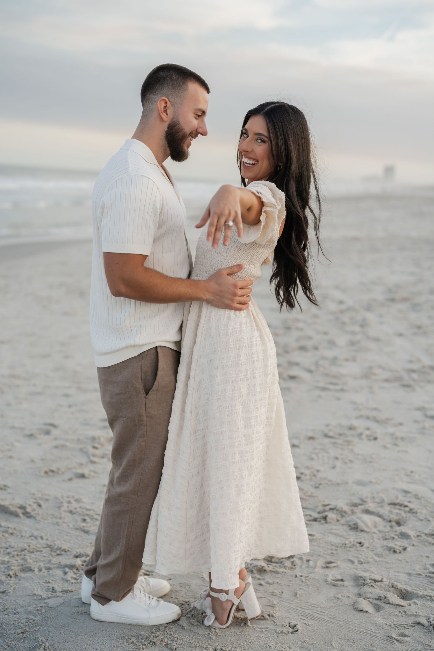 Engaged couple embracing during a Central Florida engagement session