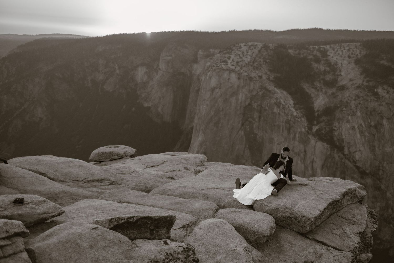 Black and white panoramic view of Yosemite Valley from Taft Point at dusk.
