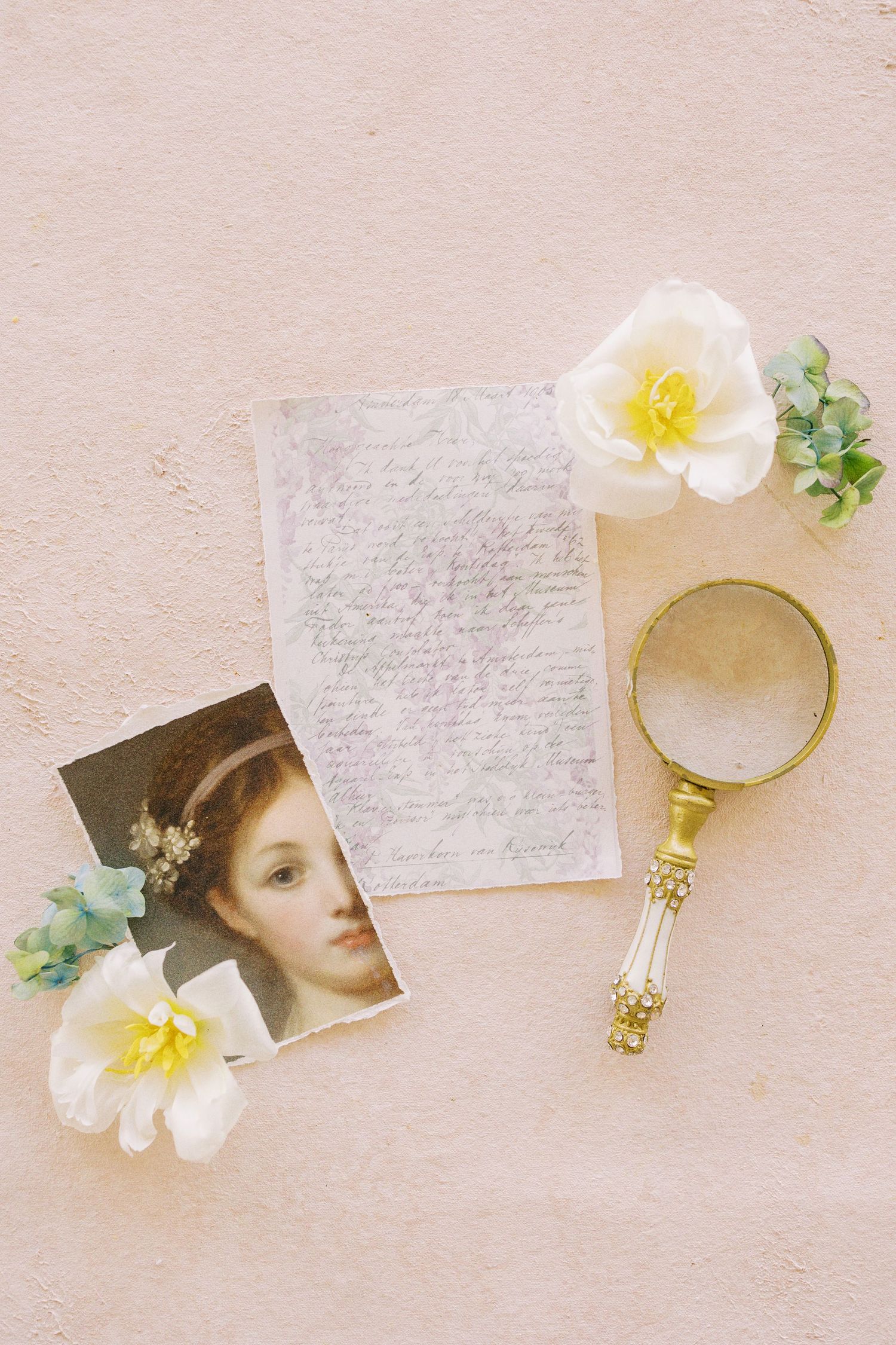 Romantic fine art flat lay featuring a vintage portrait, handwritten calligraphy, and delicate florals for the KWON PHOTO FAQ header.