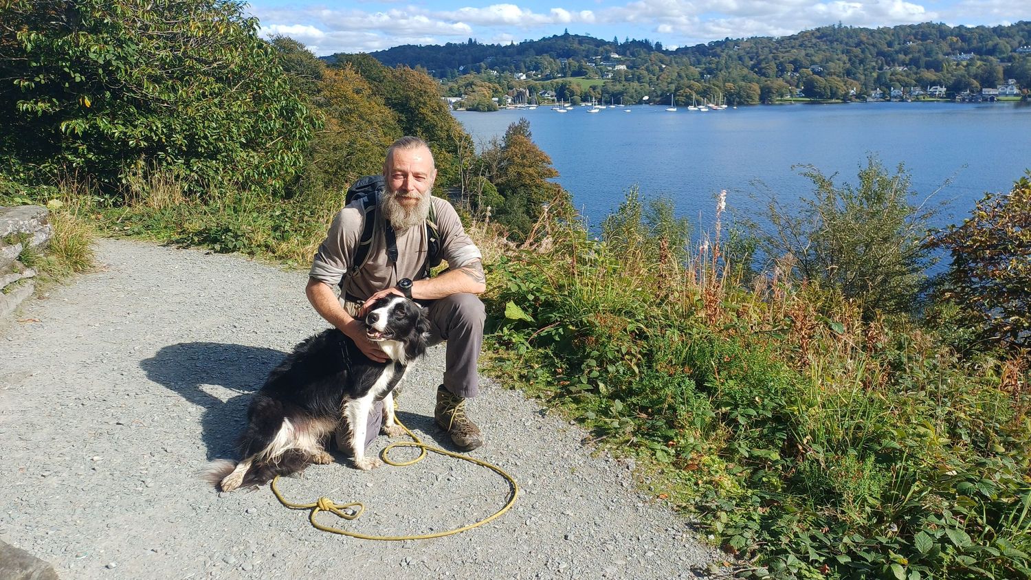 a photo of Mark Gamblin, owner of 4Ever Paw Prints Pet Photography, and his border collie Scott