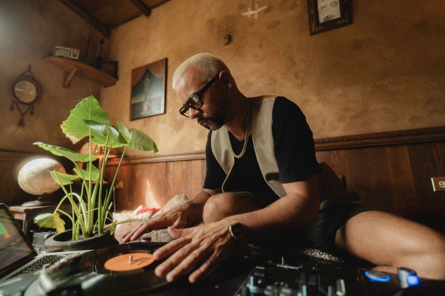 A chef's hands prepare fresh ingredients and cook various dishes in a rustic kitchen setting.