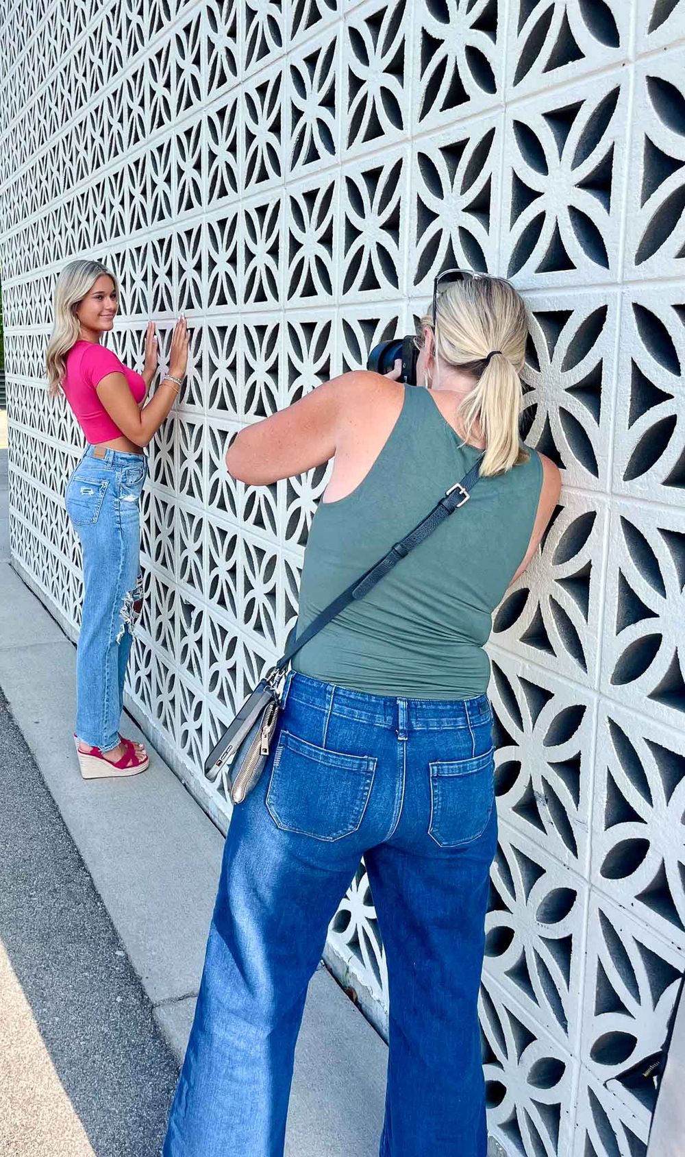 Carmen Marie Photography Grand Rapids senior photographer shooting Delaney on wall