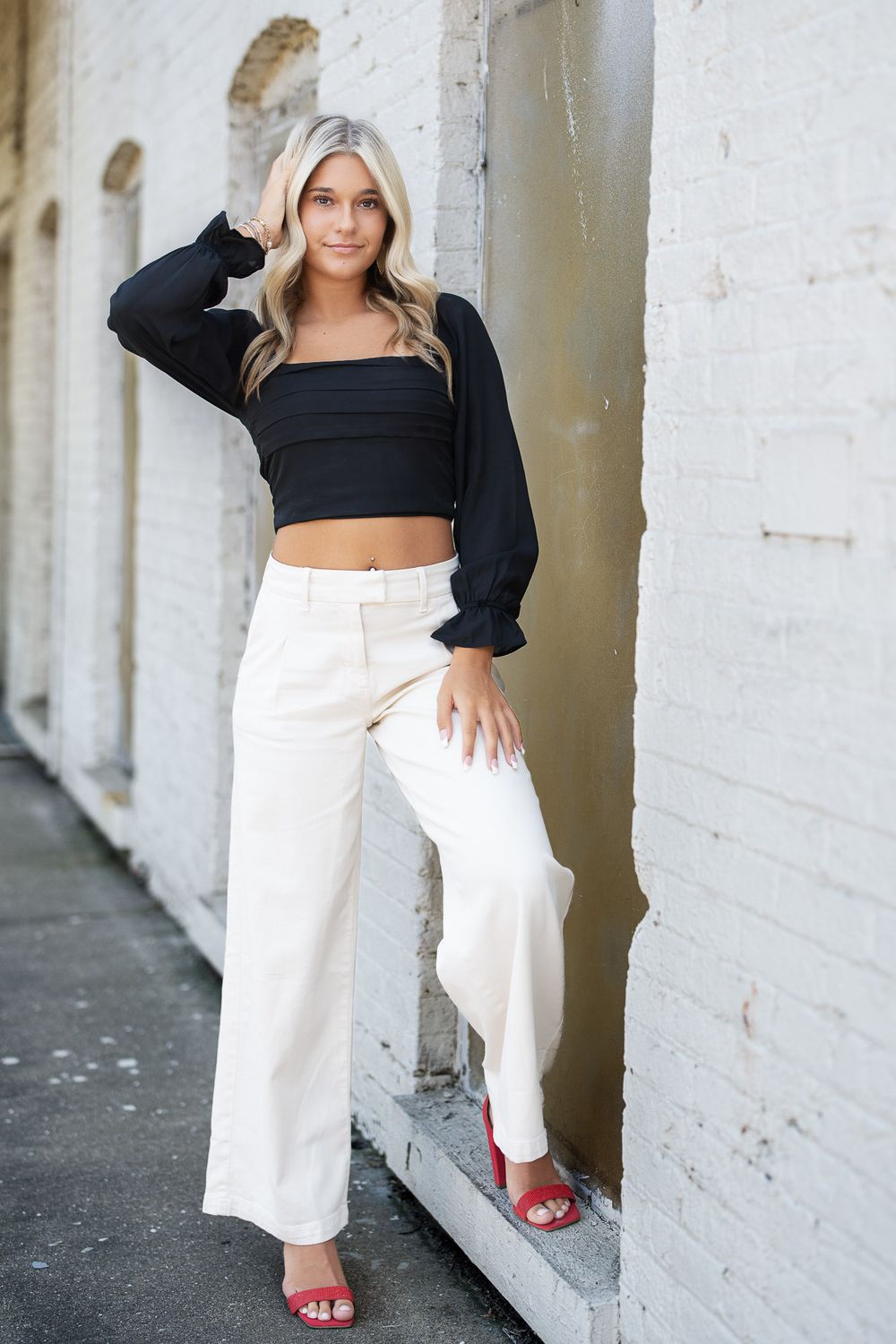 Grand Rapids senior portraits urban white brick wall