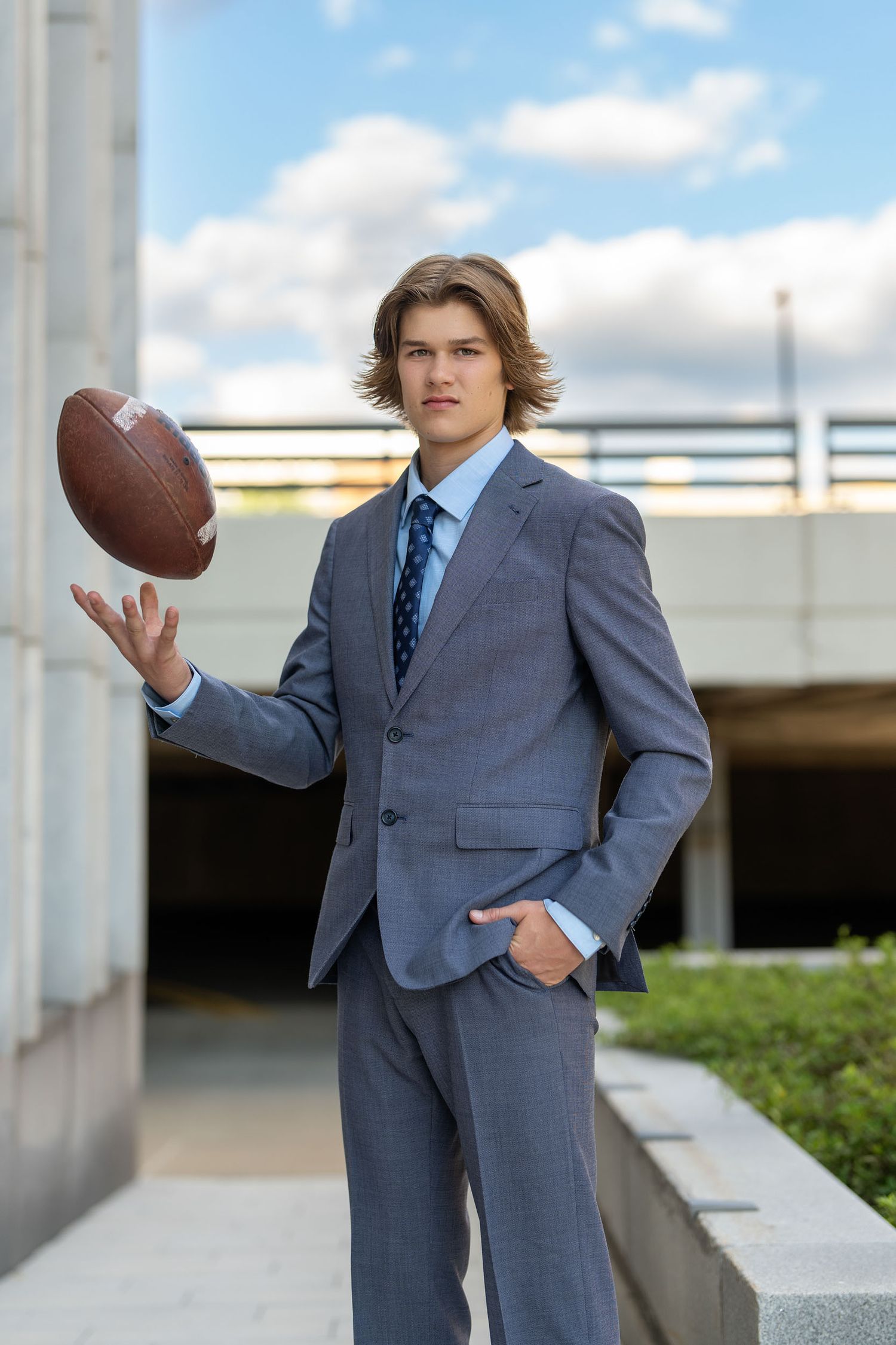 Creative senior athlete portrait in Grand Rapids highlighting personal sports and hobbies.
