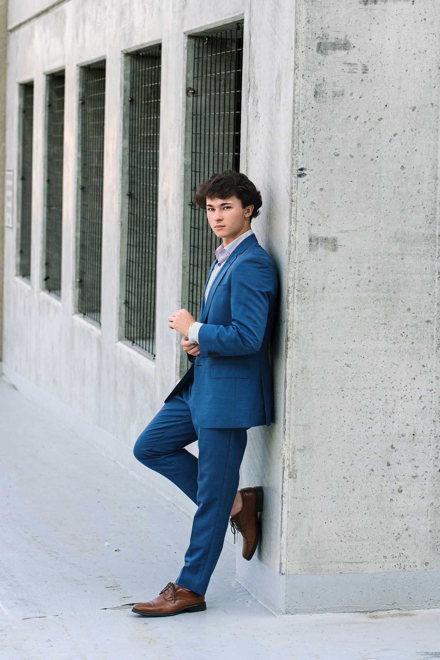 Clean and natural editing style for senior guy portraits in Grand Rapids.