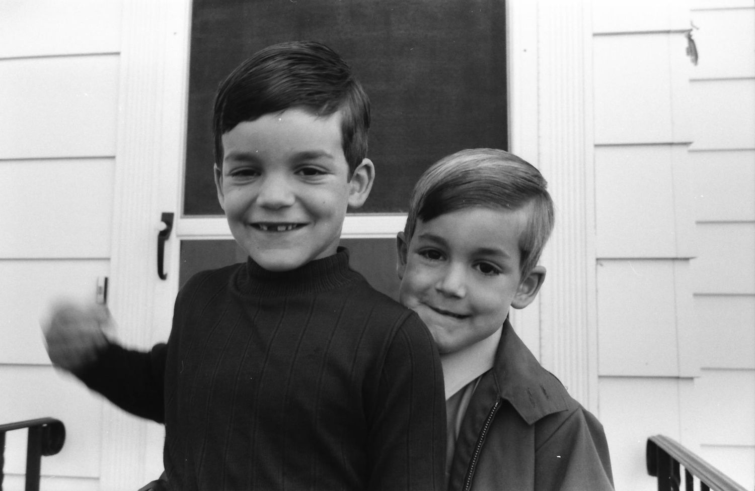 A black and white collage of candid school photos arranged in a horizontal strip.