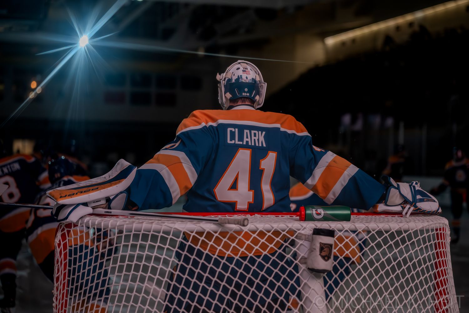 Chase Clark Hockey goalie Canisius University positioned in front of the net.