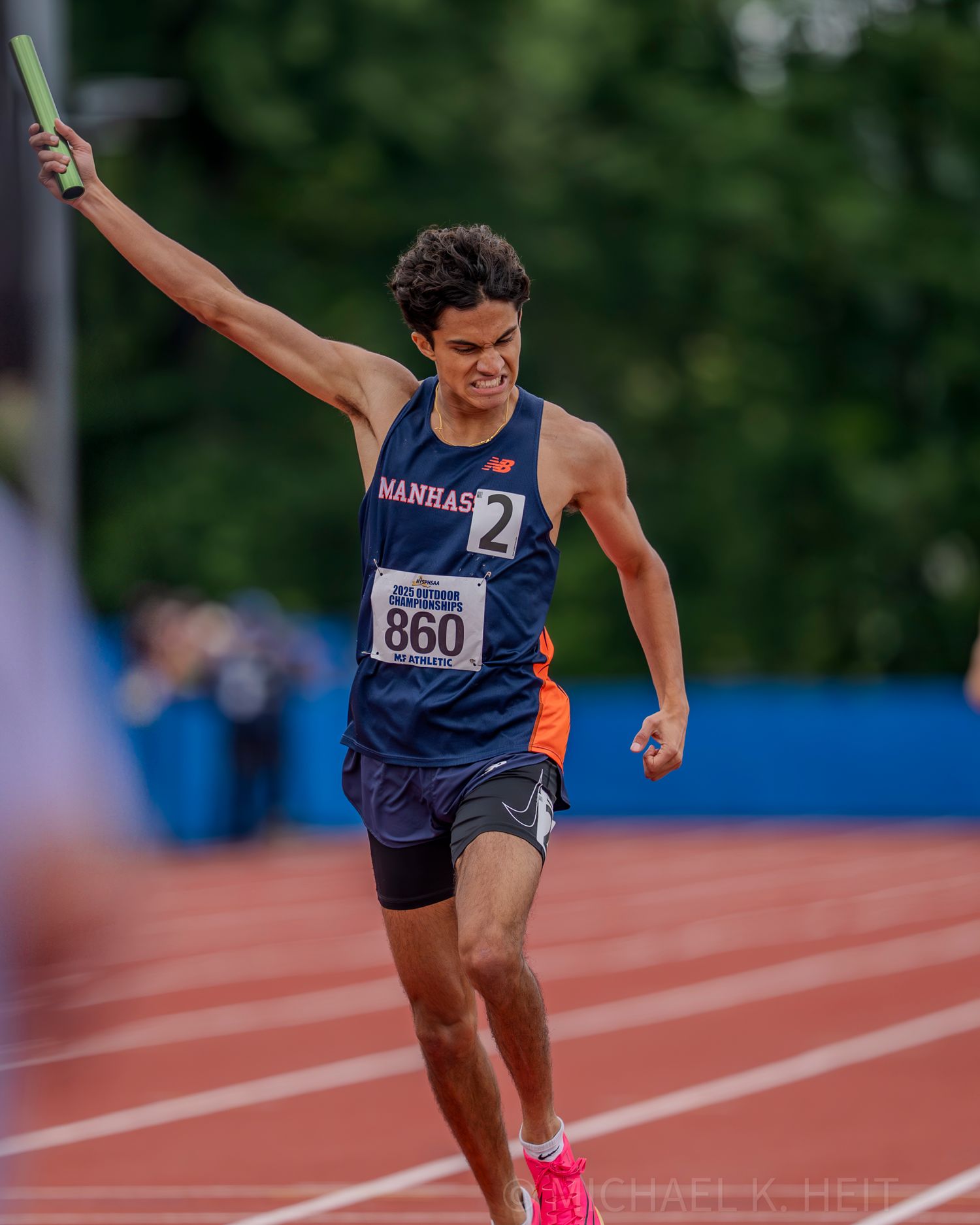 Sequence of a long jump athlete mid-flight during competition.