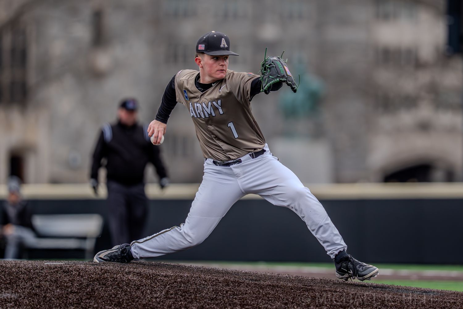 Baseball players practice defensive stances and fielding positions on the diamond.