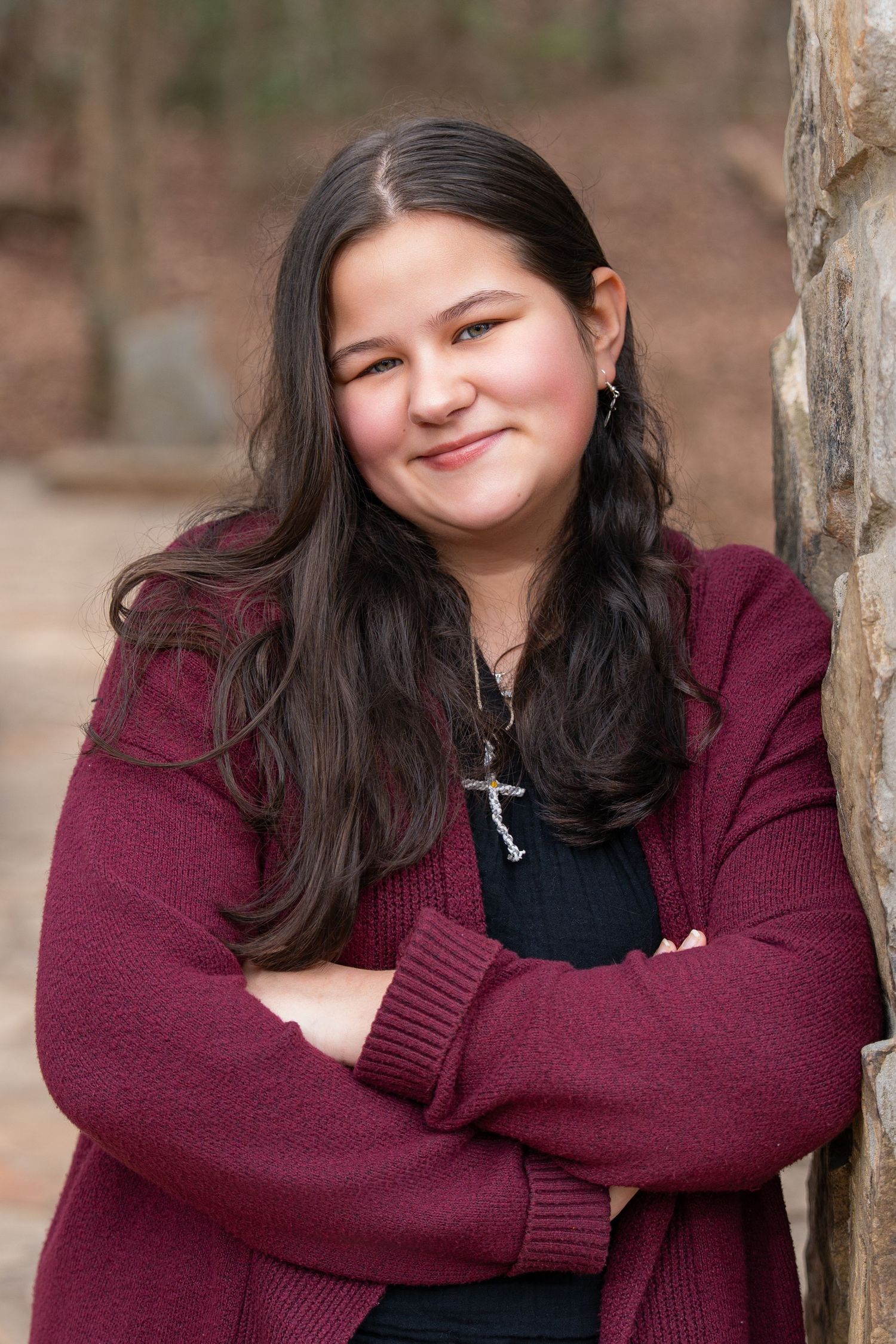 A series of candid portraits showing someone in a burgundy sweater against a natural outdoor background.