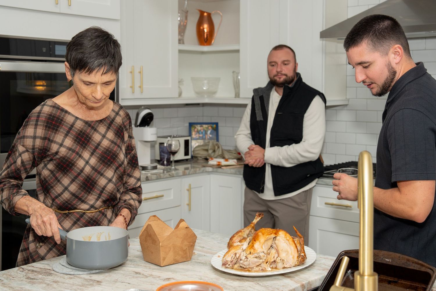 A series of cooking scenes in a white kitchen showing the preparation and serving of a bundt cake with frosting.