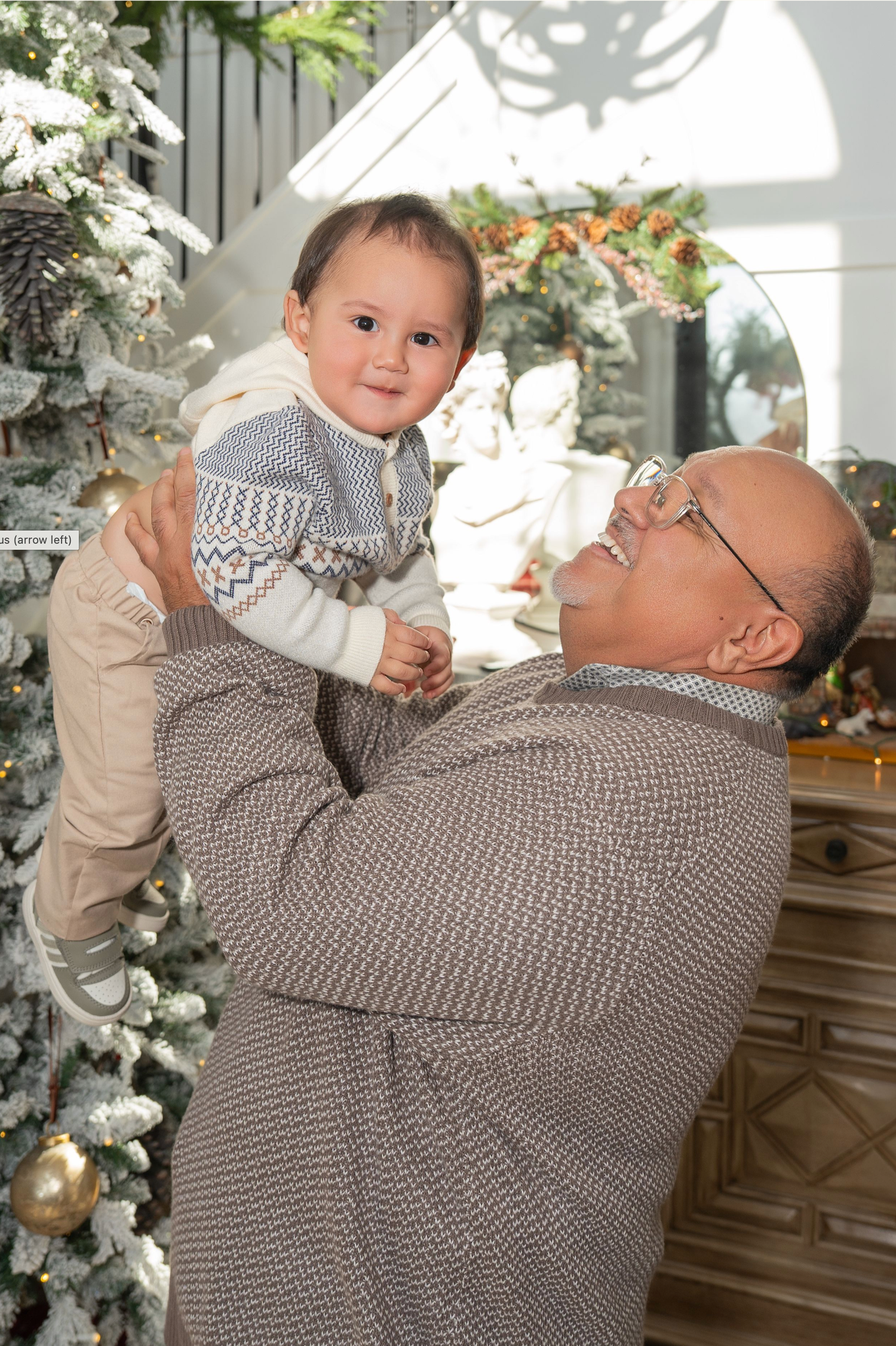 A series of heartwarming holiday photos showing tender moments between a parent and baby near festive Christmas decorations.