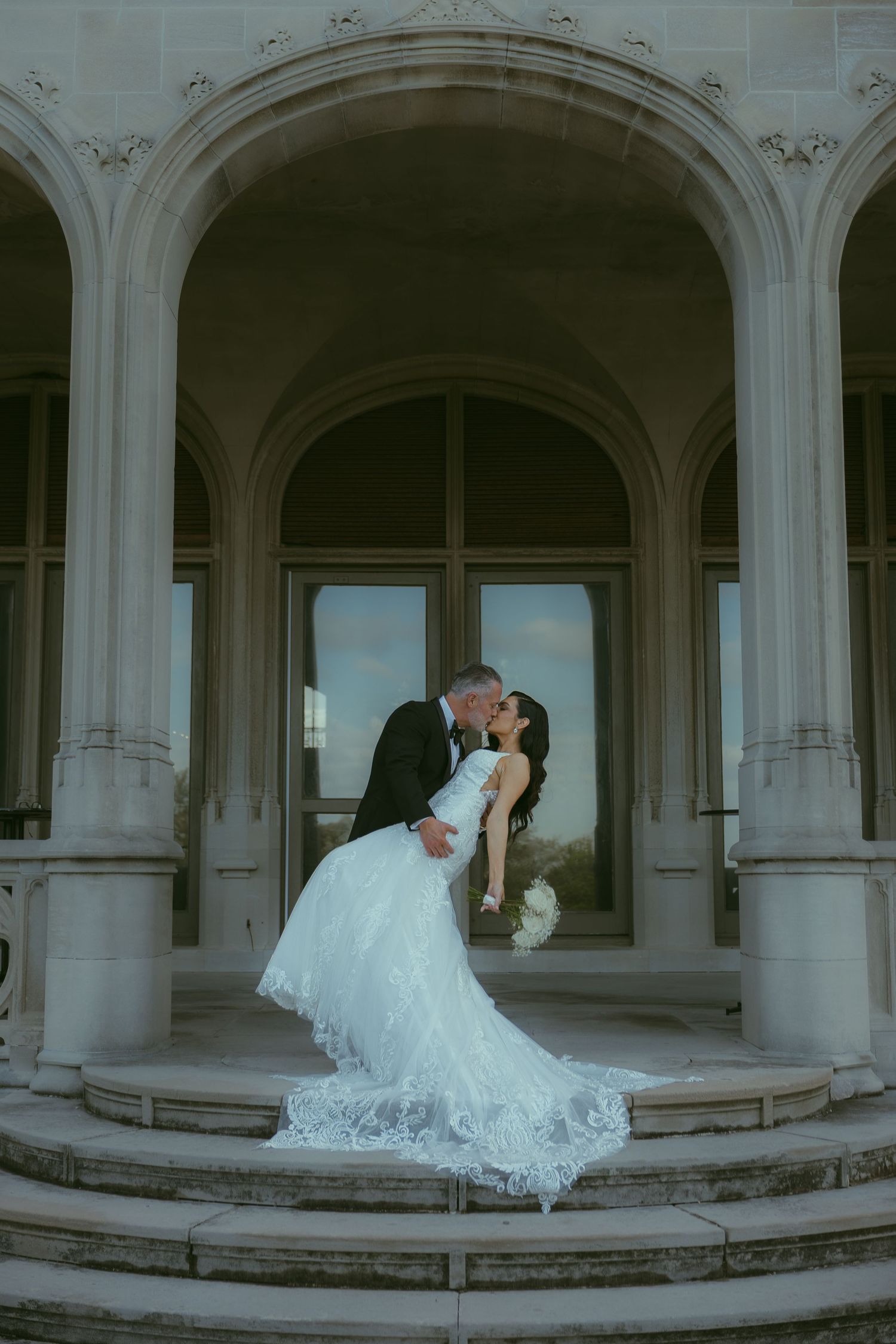 A romantic wedding photoshoot sequence under elegant white archways.