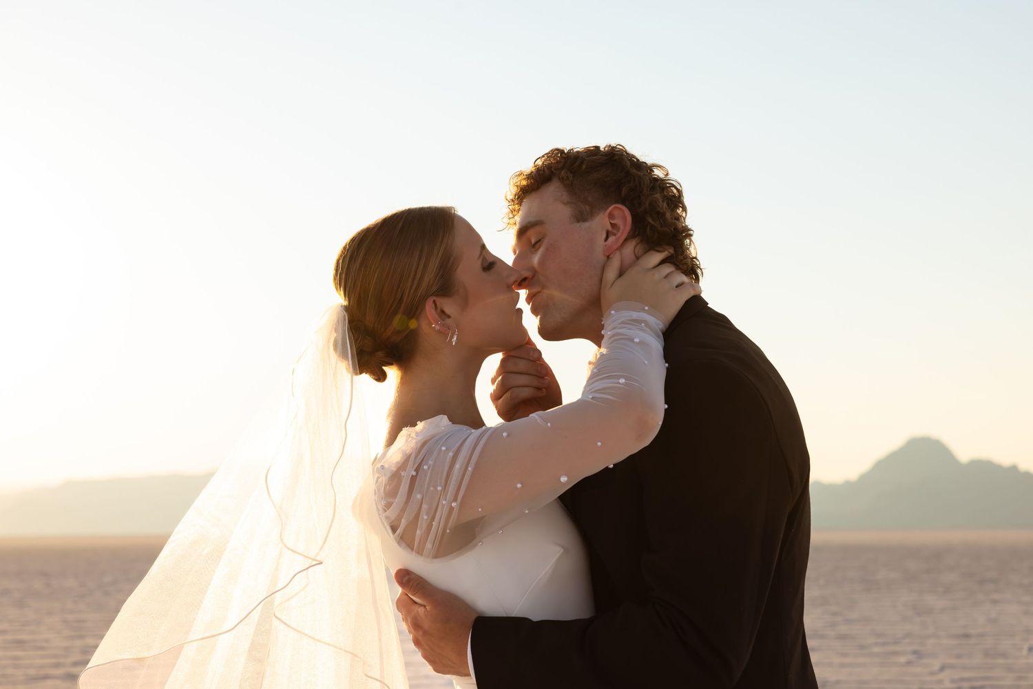 Bride and groom portraits during golden hour at the Salt Lake Flats in Utah.