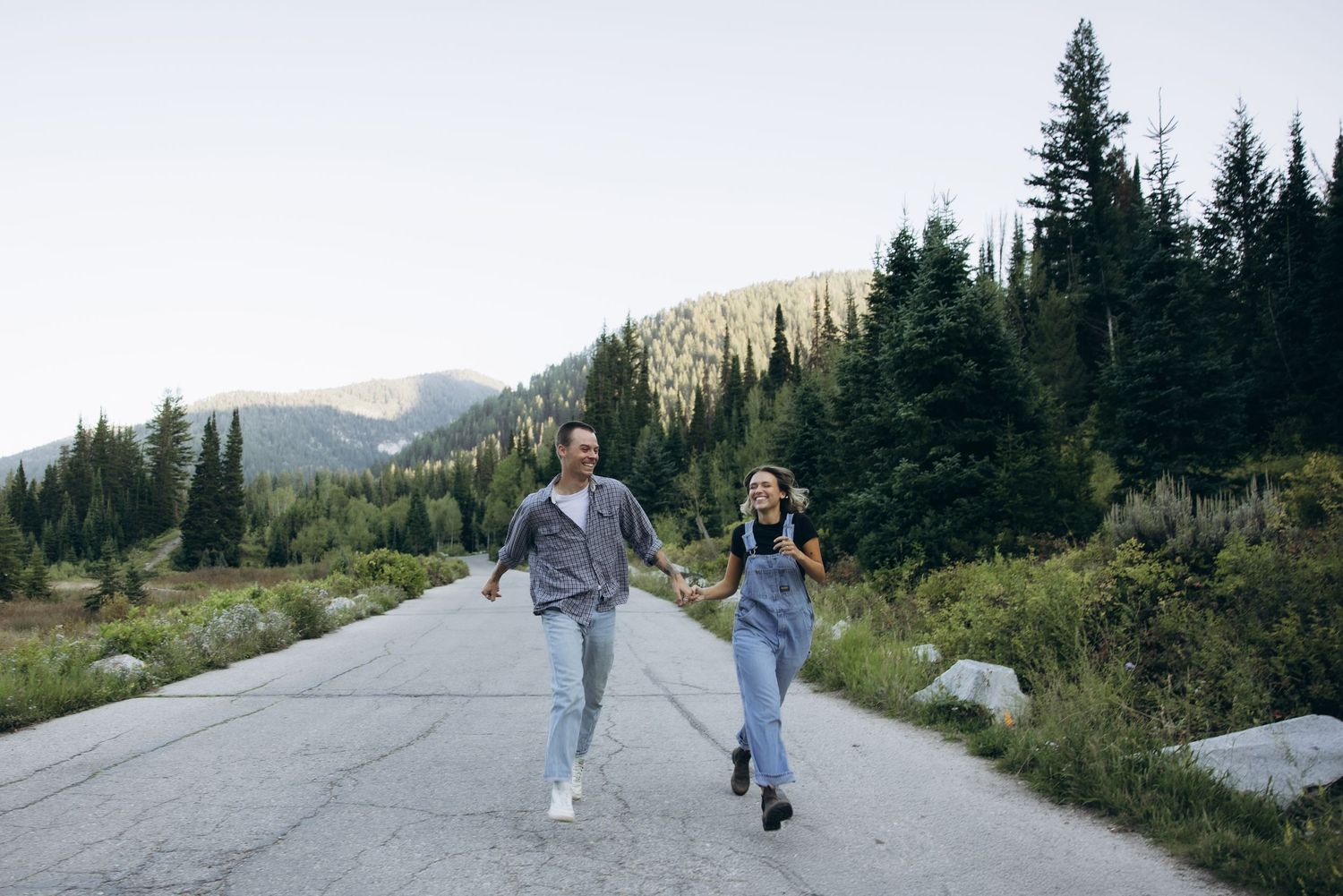 Rom-com inspired photo of a couple in the Utah Mountains.