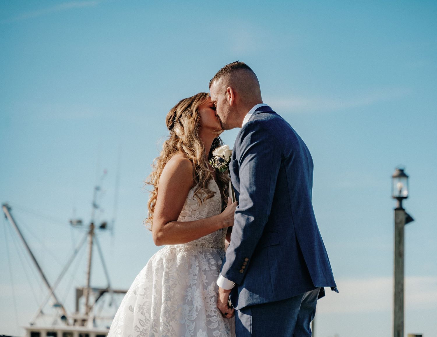 Bride and Groom sharing a first look in Port Jefferson, NY by the water
