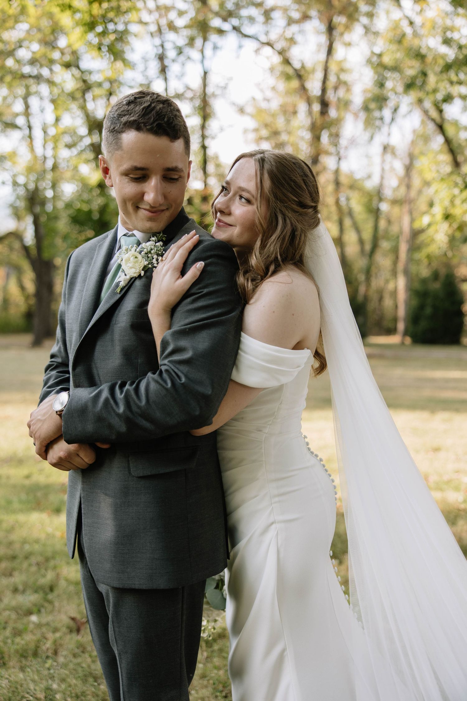 Candid wedding portraits showing intimate moments between couple in outdoor setting.