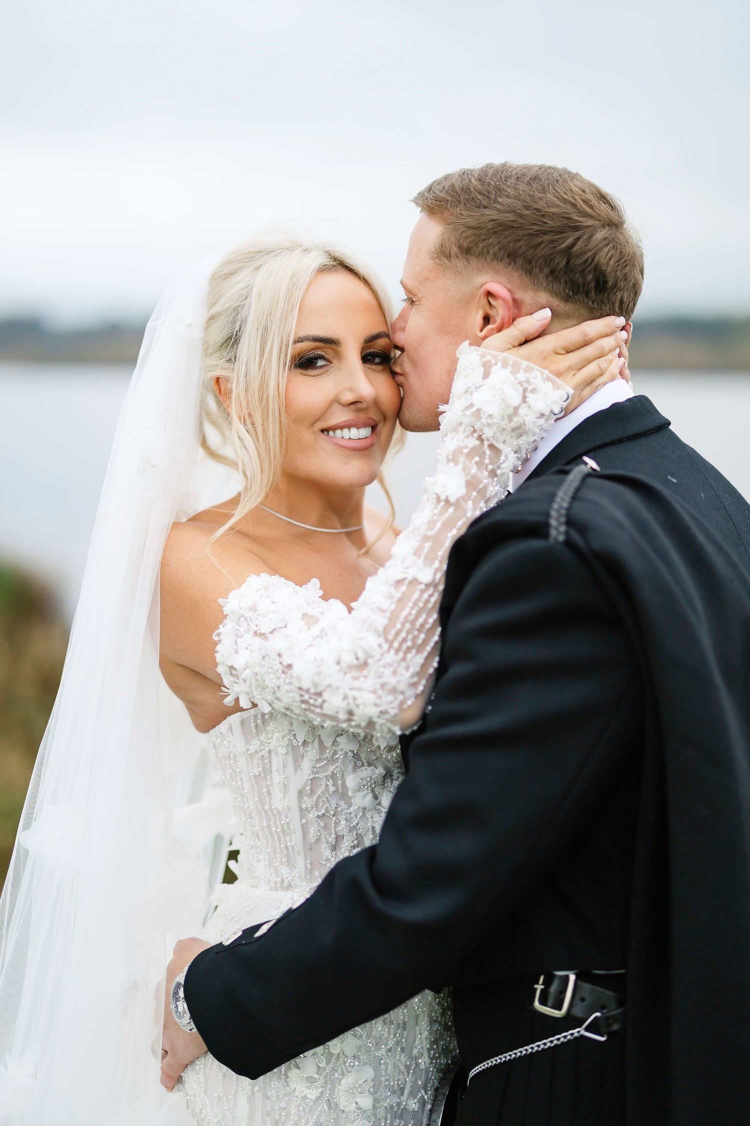 A romantic wedding photo series showing tender moments between a bride in white lace and groom in black suit.