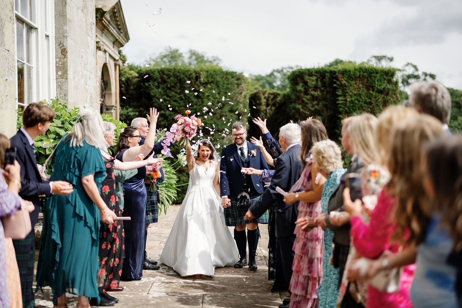 “Elegant wedding venue at Kinmount House in Scotland, featuring a grand historic mansion surrounded by lush countryside.”