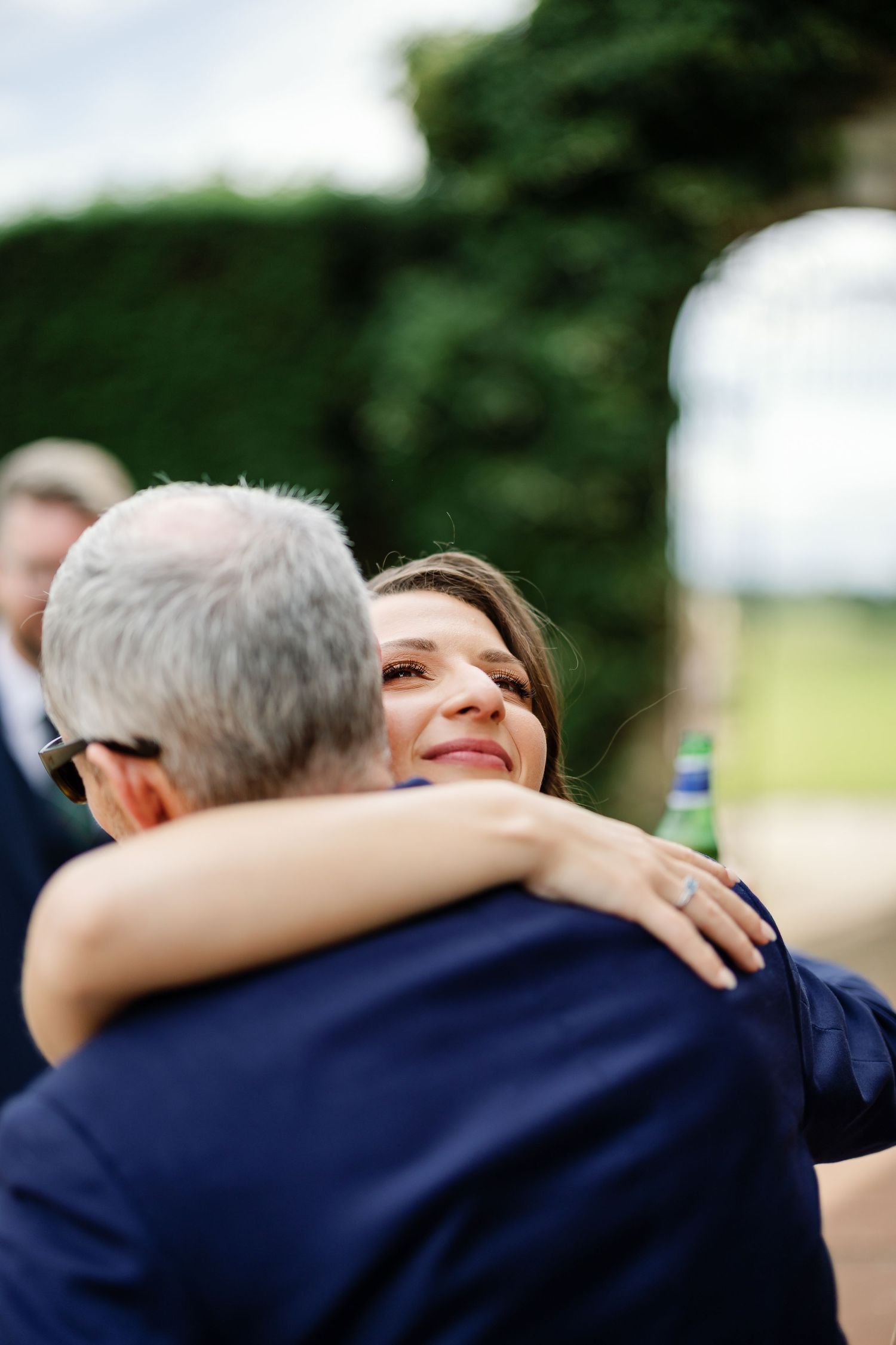 A sequence of emotional embraces captured in a series of progressive shots showing close-up hugging moments.