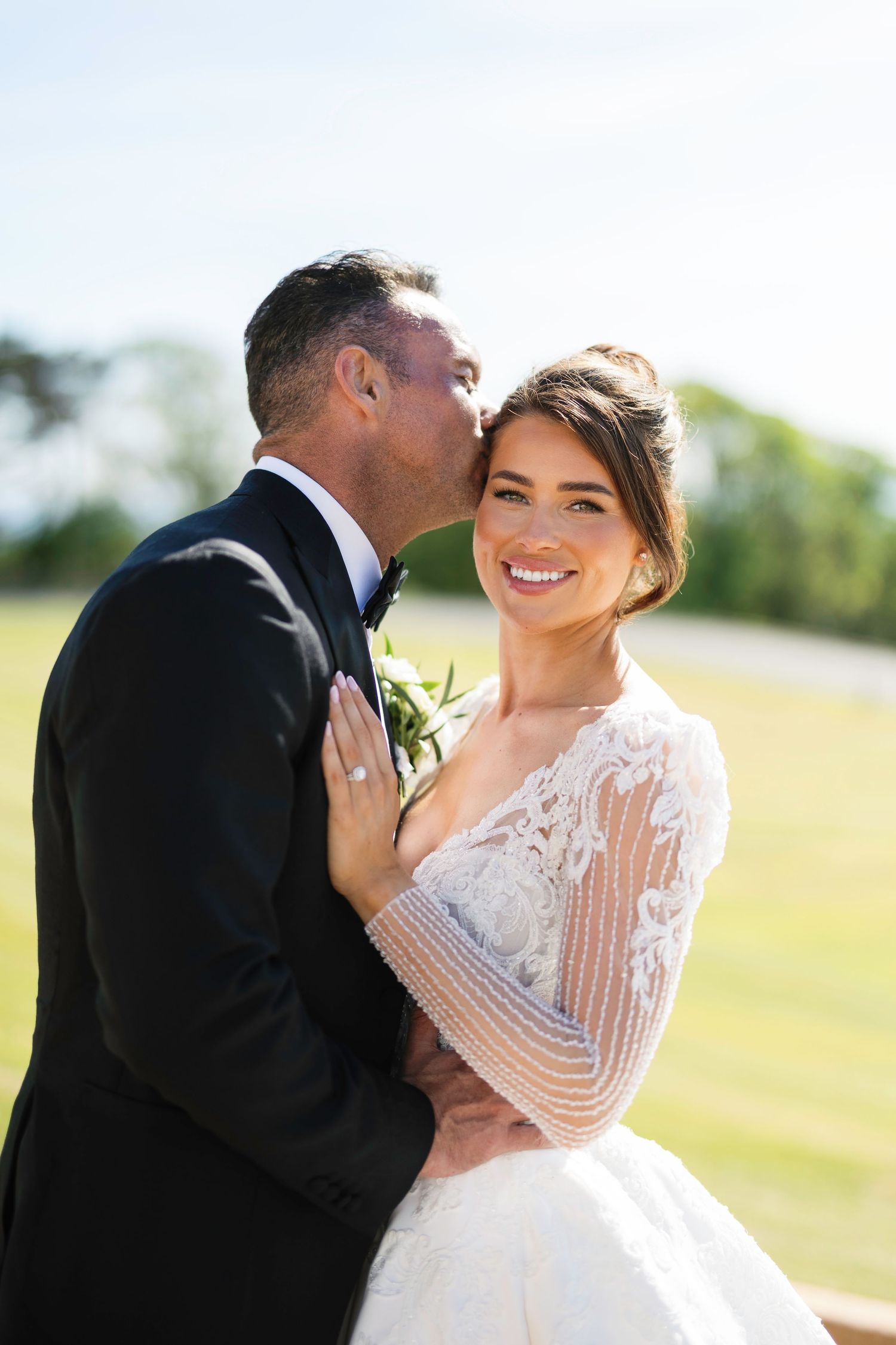 Intimate outdoor wedding portrait in bright natural sunlight. Trump Turnberry Wedding