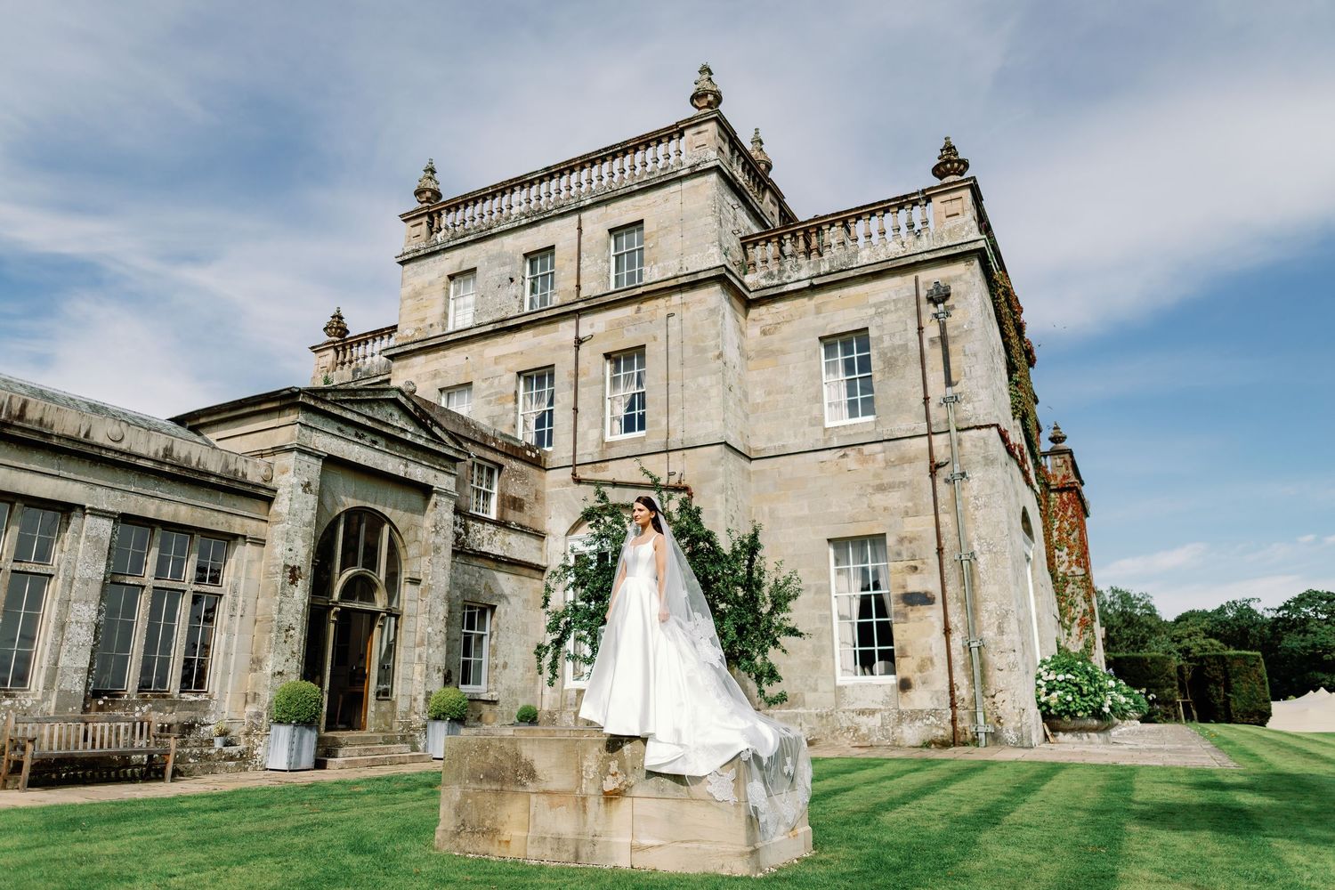 “Elegant wedding venue at Kinmount House in Scotland, featuring a grand historic mansion surrounded by lush countryside.”