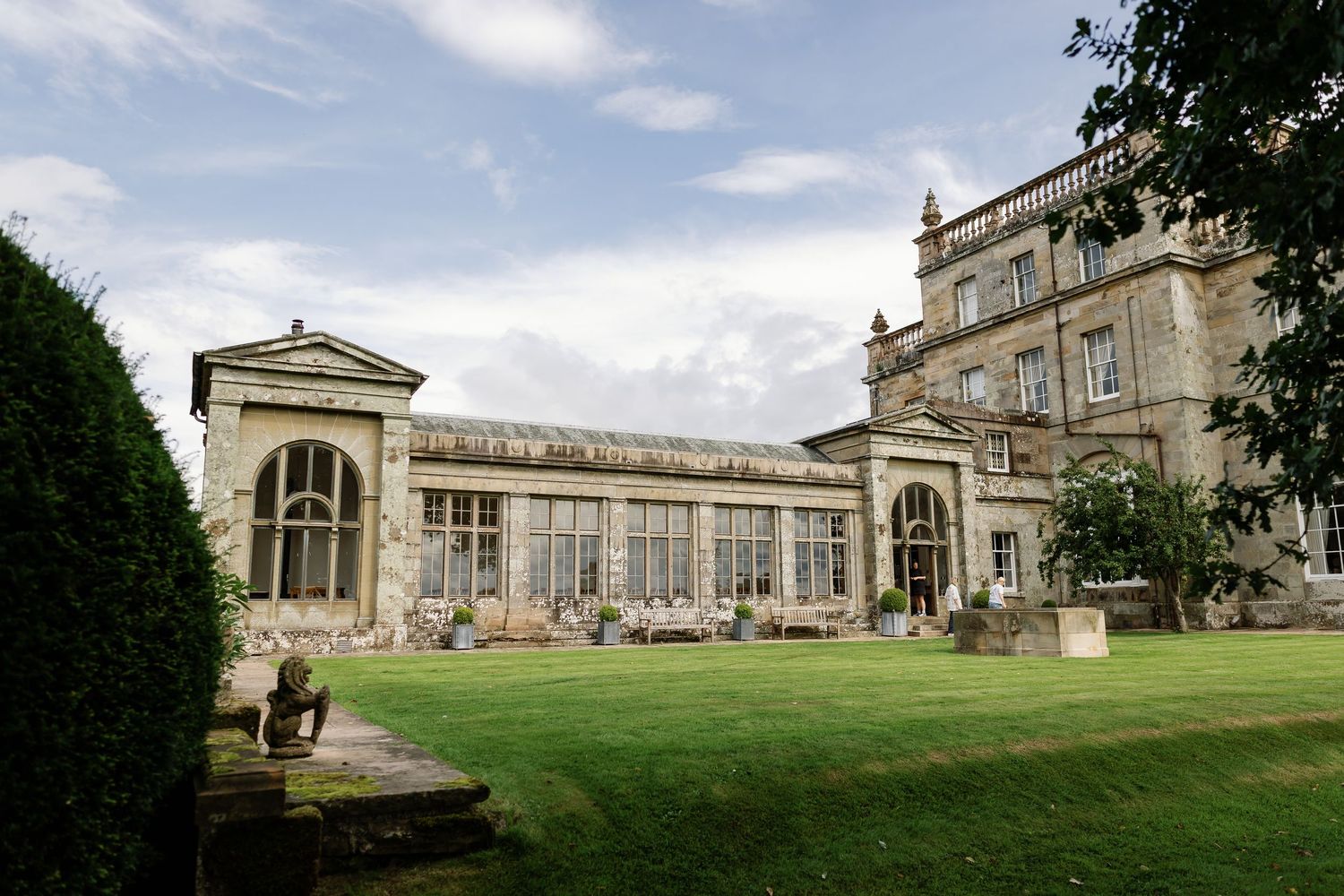 “Elegant wedding venue at Kinmount House in Scotland, featuring a grand historic mansion surrounded by lush countryside.”