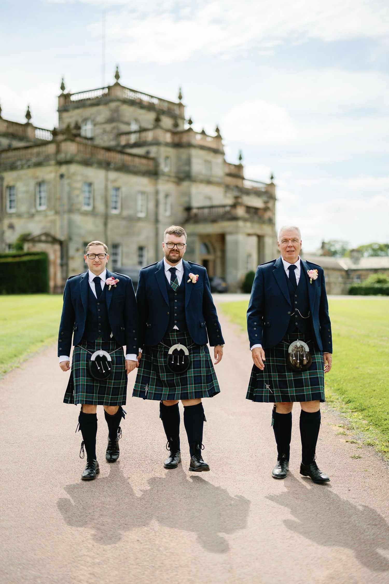 “Elegant wedding venue at Kinmount House in Scotland, featuring a grand historic mansion surrounded by lush countryside.”