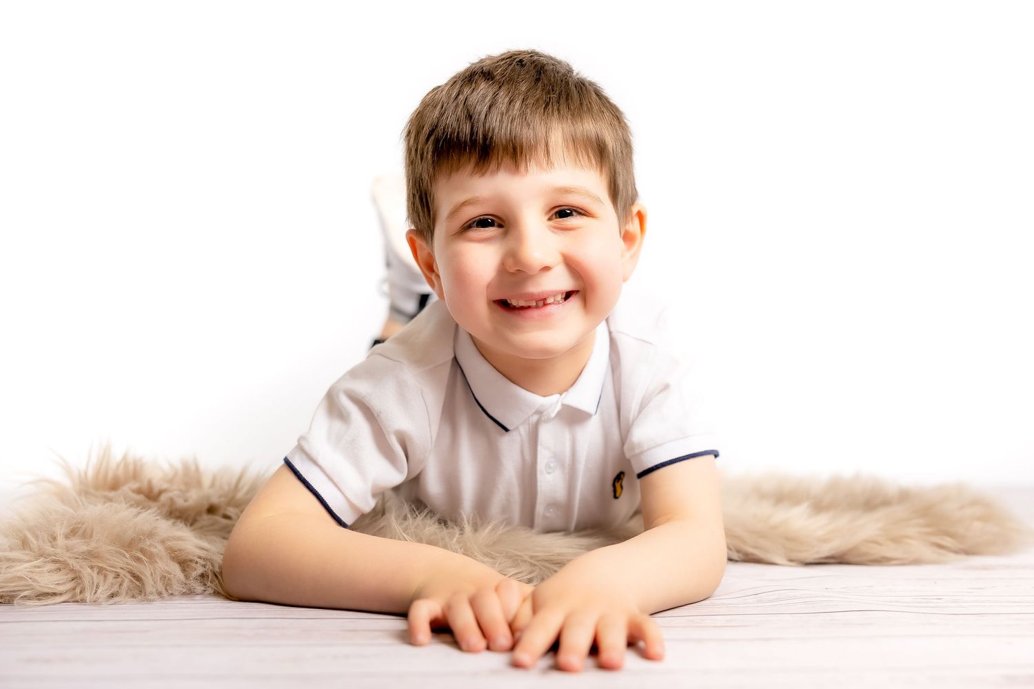 nursery boy photo on the mat floor