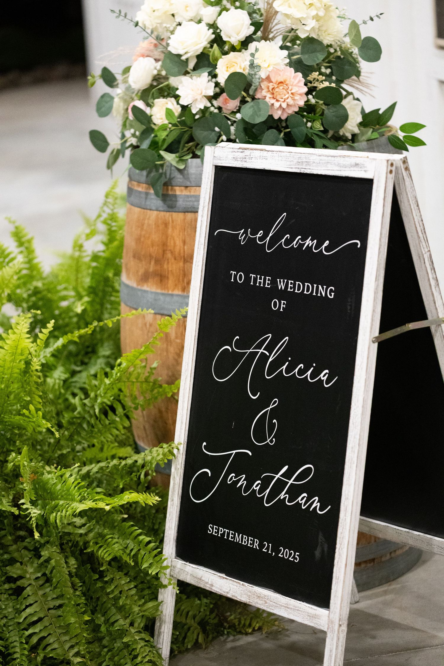 Elegant chalkboard wedding welcome sign for Alicia and Jonathan, September 21, 2025.