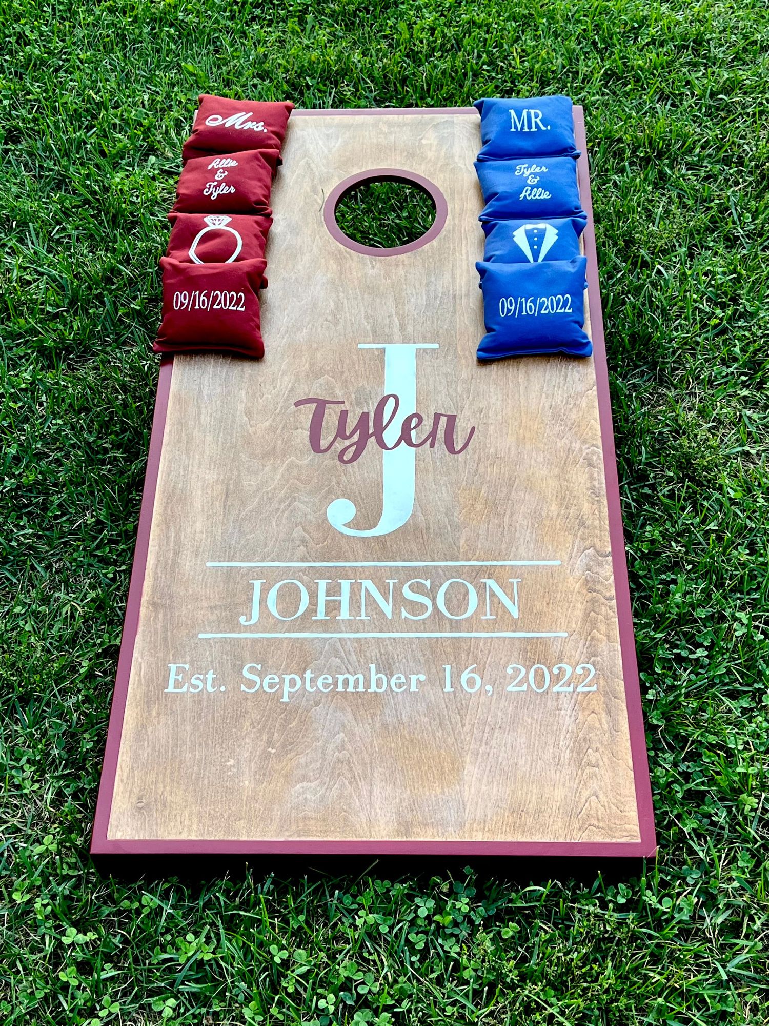 Custom personalized cornhole board for Tyler Johnson wedding established September 16 2022.