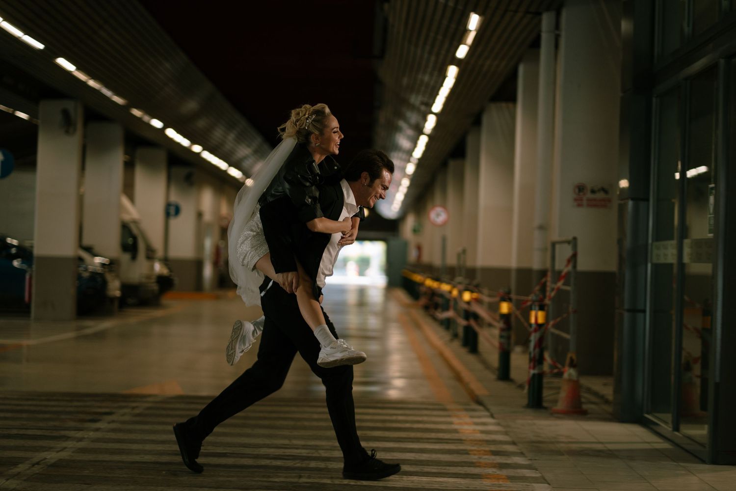 Happy couple running together