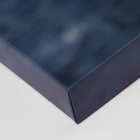 Navy blue leather-wrapped box with sleek modern design and subtle texture, perfect for elegant storage solutions.