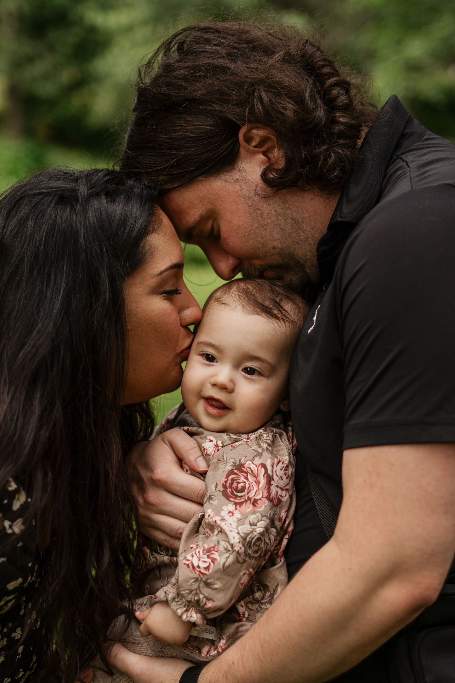 A series of tender family moments captured in a sequence showing parents lovingly embracing their young child in a floral dress.