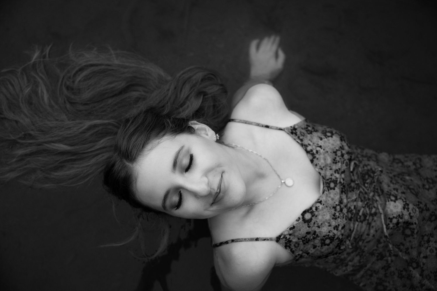 Artistic black and white portrait series with dramatic lighting and poses.