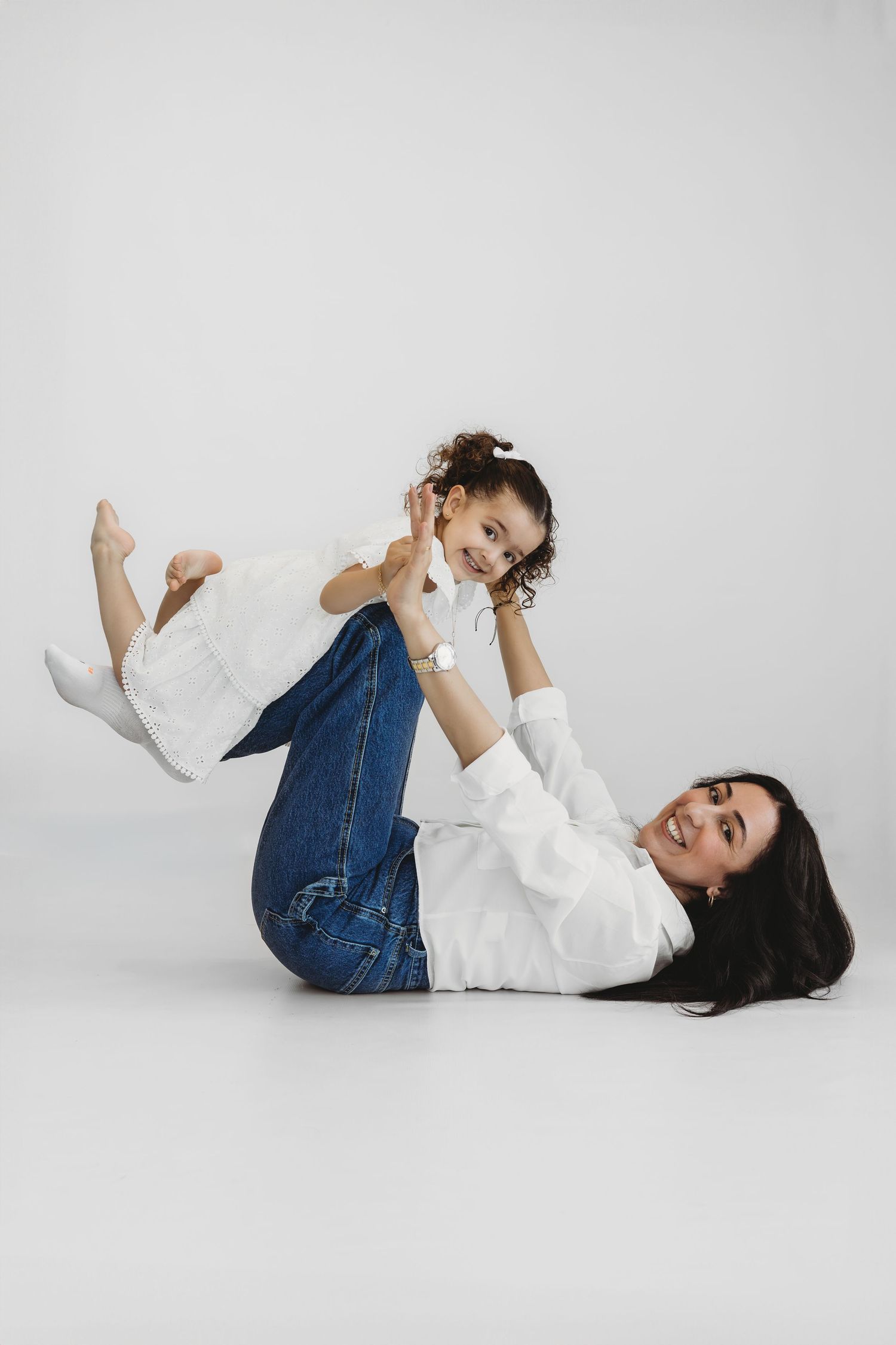 Natural, joyful family portrait in a calm studio session in Lebanon