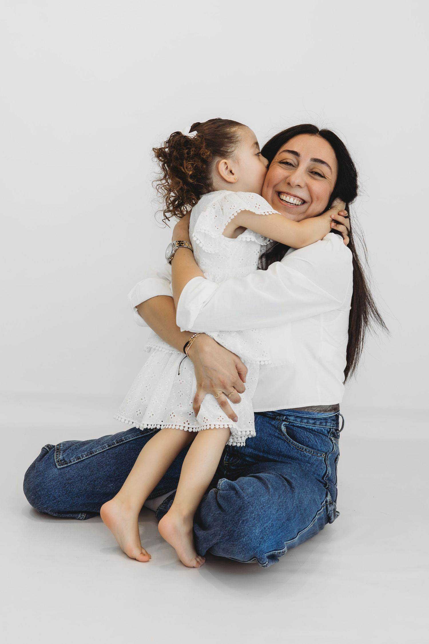 Family of parents and children captured in a timeless studio session in Dbayeh, Lebanon
