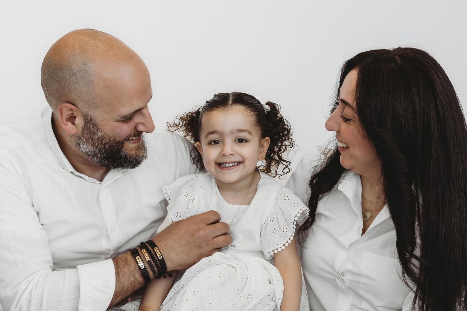 Family photoshoot with parents and daughter by Dounia Raphael Photography in Dbayeh, Lebanon