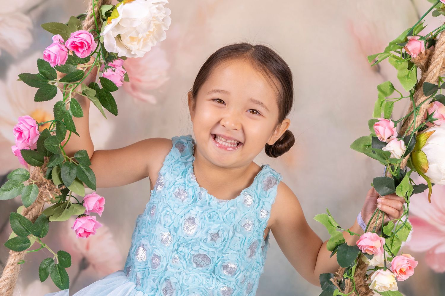 Girl on swing, studio portrait, Hamilton based Photographer, New Zealand