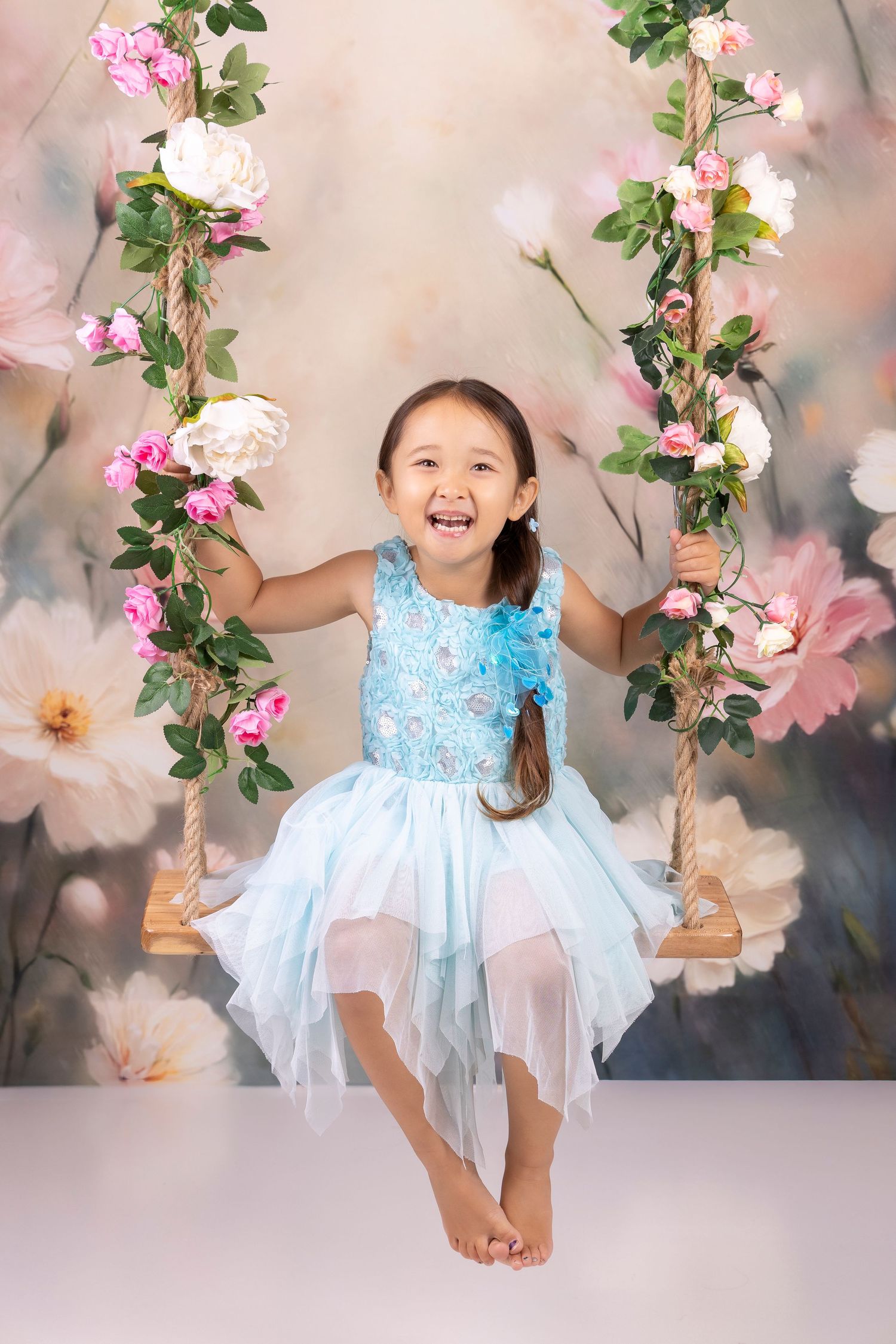 Girl on swing, studio portrait, Hamilton based Photographer, New Zealand