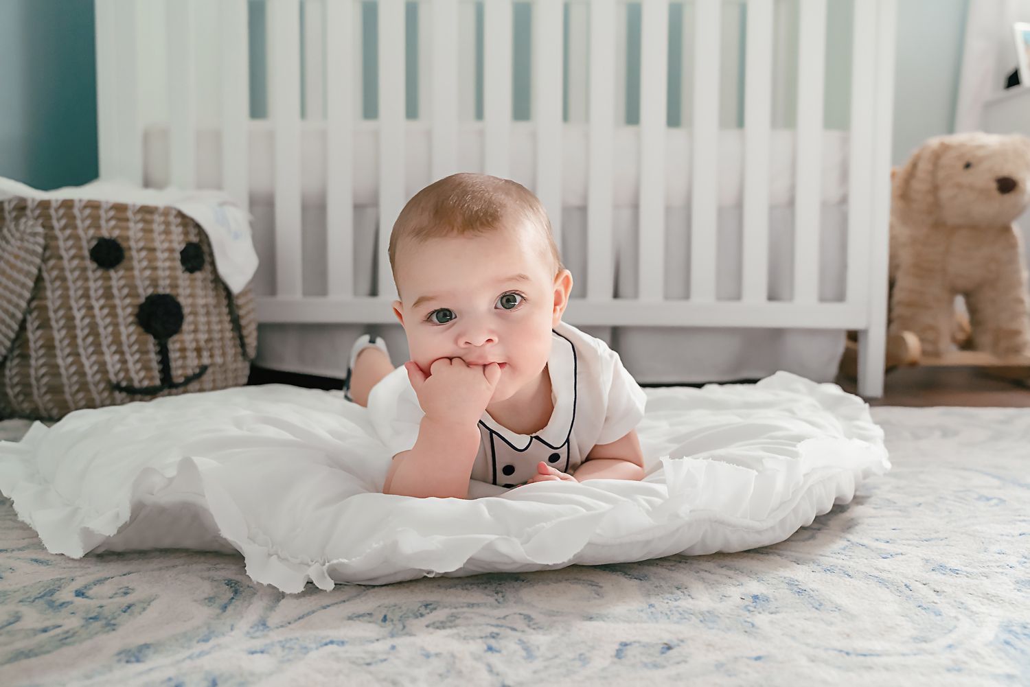 Adorable lifestyle portrait session for a 6 month old little boy in Lexington South Carolina that documents him in his nursery.