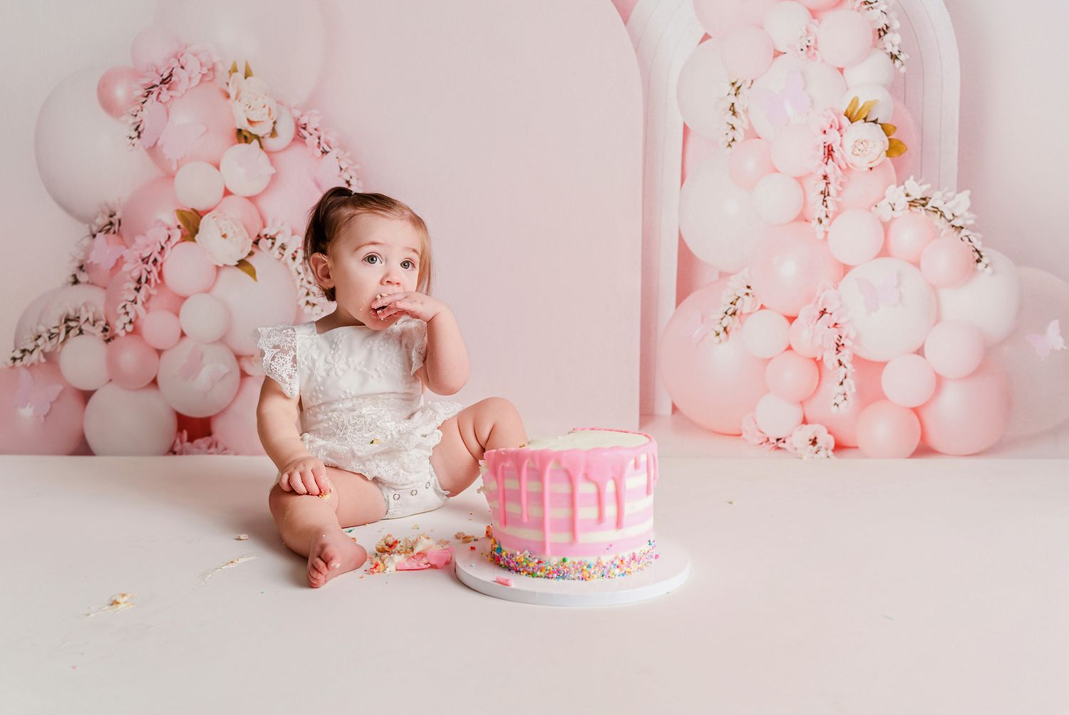 Beautiful delicate girly pink, white and gold themed first birthday cake smash for a client from Lexington SC.